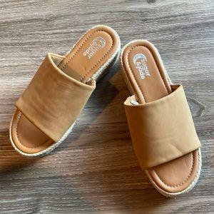 Brand new, never worn. Girls size 4 wedge sandals